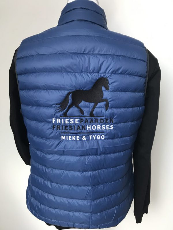 Ladies Down vest, indigo blue, with logo Friese Paarden/Friesian Horses, by ZijHaven3, borduurstudio Lemmer